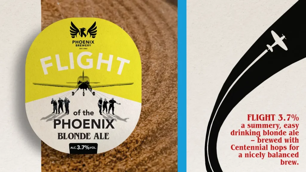 Label and promotional design for 'Flight of the Phoenix Blonde Ale' by Phoenix Brewery. The label features a silhouette of a plane with figures below, set against a yellow and white background. The text reads 'PHOENIX BREWERY EST. 1982,' 'FLIGHT of the PHOENIX,' and 'BLONDE ALE ALC. 3.7% VOL.' The promotional side shows a black silhouette of a plane with a trail, and text describing the ale as a summery, easy drinking blonde ale brewed with Centennial hops for a nicely balanced brew.