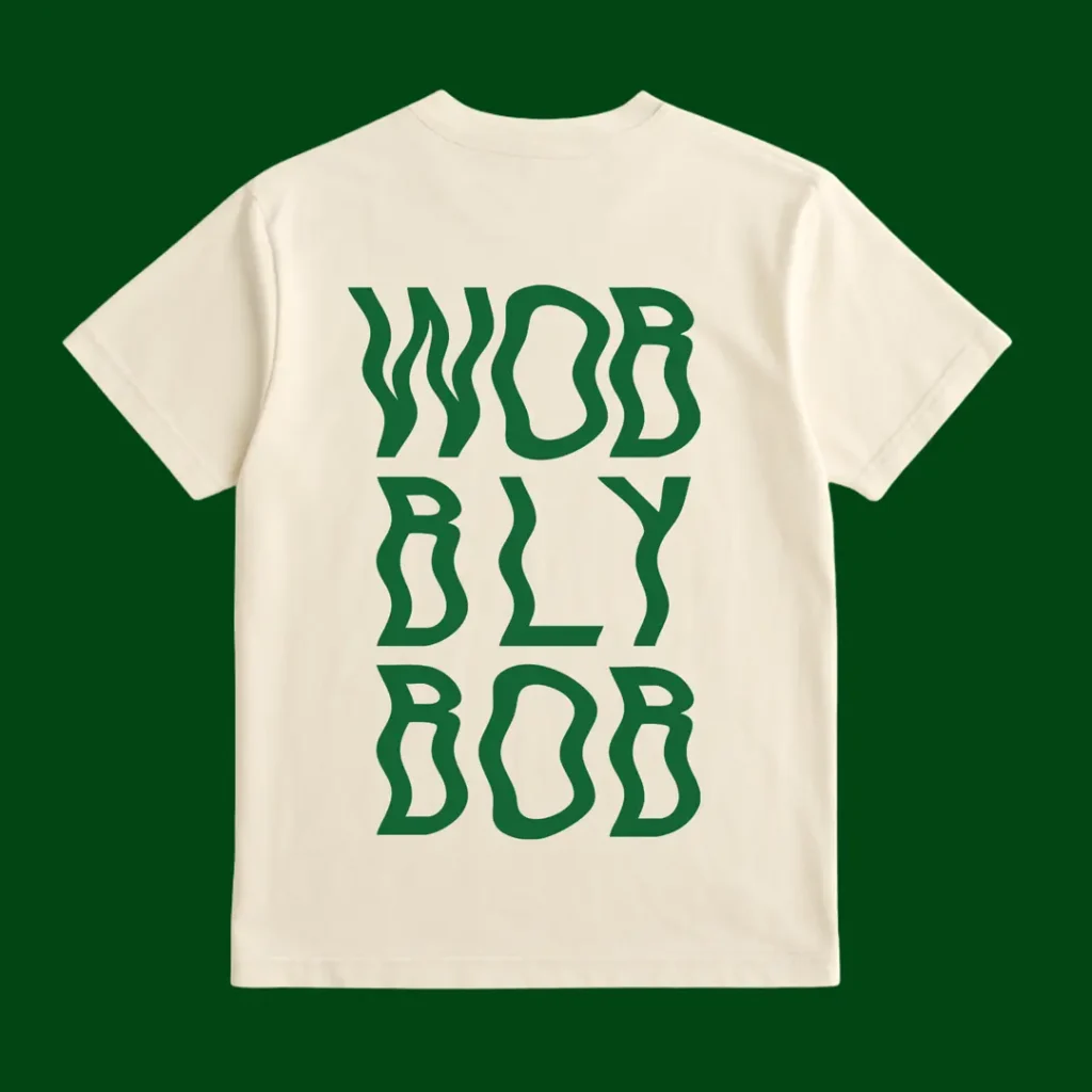Cream t-shirt back print with large dark green wavy "WOBBLY BOB" stacked text on a dark green background