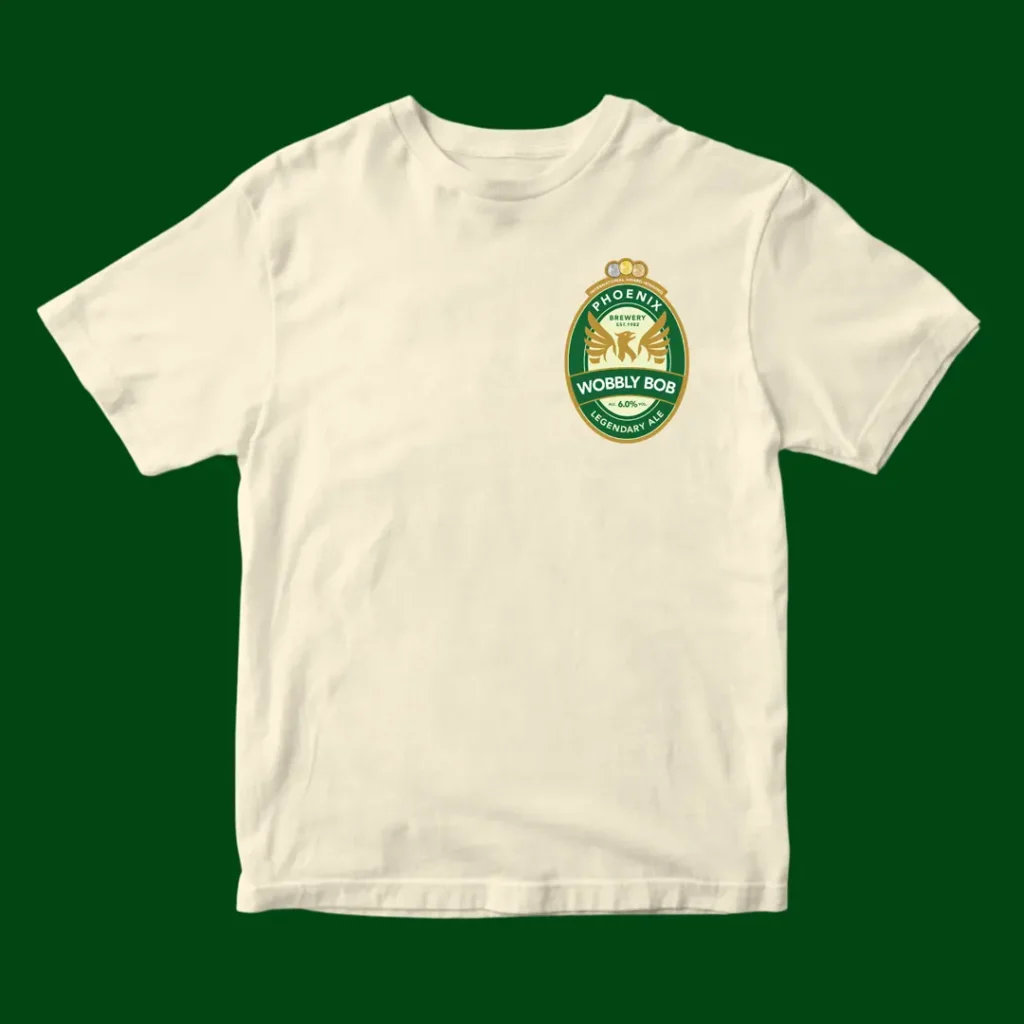 Cream t-shirt front with small Wobbly Bob beer label chest print on a dark green background